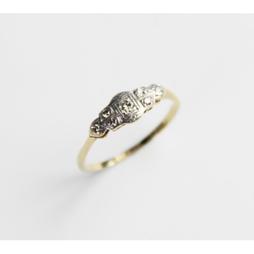 270 - An early 20th century diamond set ring, comprising a  central round brilliant cut diamond weighing a... 