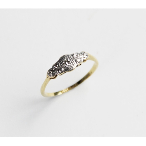 270 - An early 20th century diamond set ring, comprising a  central round brilliant cut diamond weighing a... 