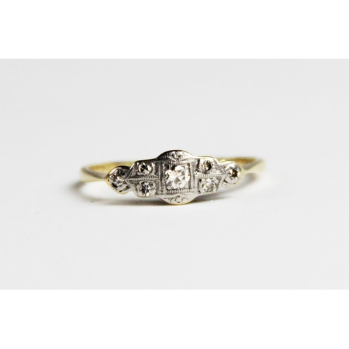 270 - An early 20th century diamond set ring, comprising a  central round brilliant cut diamond weighing a... 