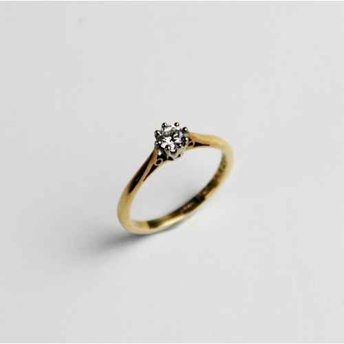 272 - A diamond solitaire ring, the central round brilliant cut diamond weighing an estimated 0.20 carats,... 