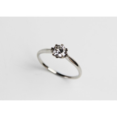 188 - A diamond solitaire ring, the central round brilliant cut diamond weighing approx. 0.73 carats, clar... 