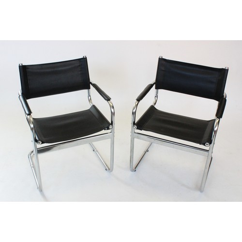 840 - A pair of modern cantilever elbow chairs, late 20th century, each with a leather back rest and seat ... 