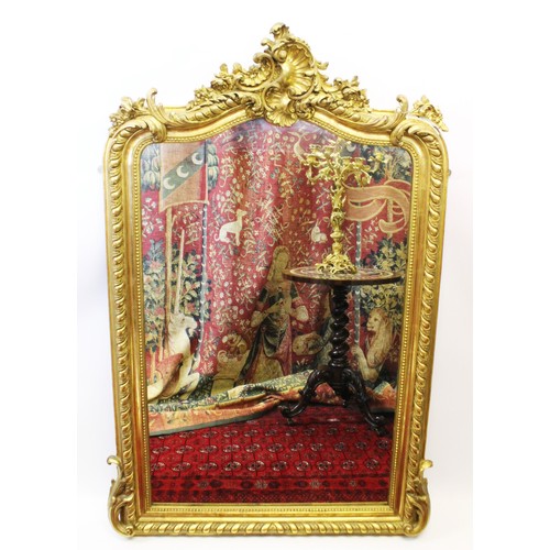 818 - A French Louis XVI style gilt wood and gesso over mantle mirror, early 20th century, with a gilt she... 