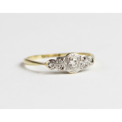 270 - An early 20th century diamond set ring, comprising a  central round brilliant cut diamond weighing a... 