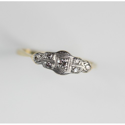 270 - An early 20th century diamond set ring, comprising a  central round brilliant cut diamond weighing a... 