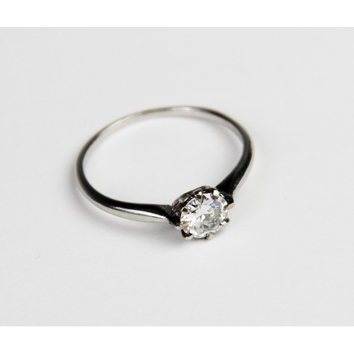 188 - A diamond solitaire ring, the central round brilliant cut diamond weighing approx. 0.73 carats, clar... 