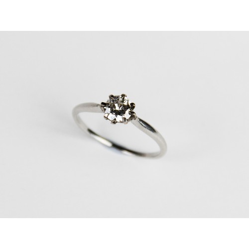 188 - A diamond solitaire ring, the central round brilliant cut diamond weighing approx. 0.73 carats, clar... 