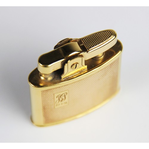 A gold plated Ronson lighter, of rectangular form engine turned decoration with cartouche engra
