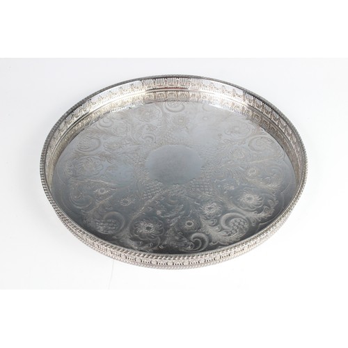 106 - A quantity of silver plated and white metal wares, to include a large twin-handled silver plated tra... 