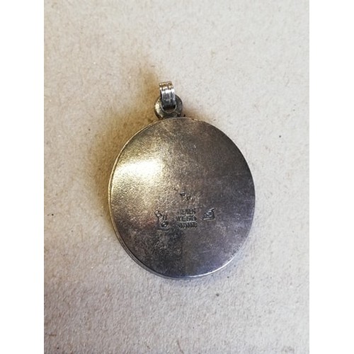 166 - A silver coloured locket pendant in the manner of Berthold Loffler for Wiener Werkstatte, of oval fo... 