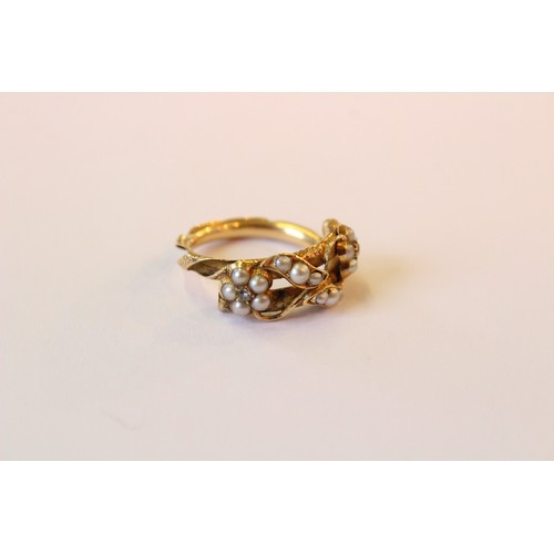 236 - A 19th century diamond and pearl Victorian memorial ring, designed as two interwoven flowers each se... 