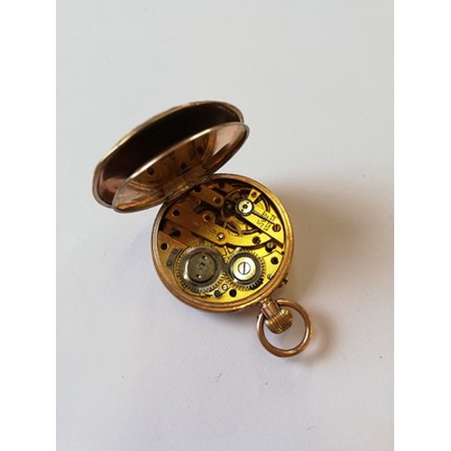 130 - An Edwardian 9ct gold lady's fob watch, London import marks for 1907, the gold toned dial with engra... 