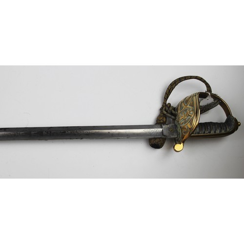 342 - A Naval officer's dress sword, 20th century, the 79.cm single edge curved fullered steel blade light... 