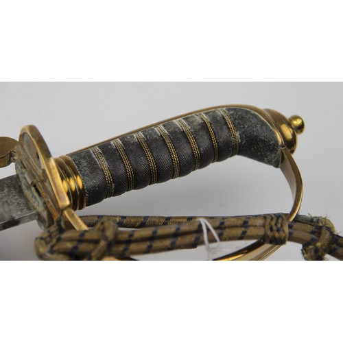 342 - A Naval officer's dress sword, 20th century, the 79.cm single edge curved fullered steel blade light... 