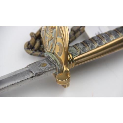 342 - A Naval officer's dress sword, 20th century, the 79.cm single edge curved fullered steel blade light... 