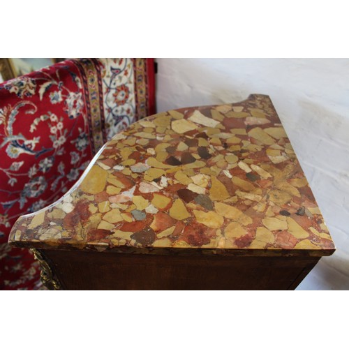 822 - A Louis XVI style marble top serpentine rosewood encoignure, 20th century, the rouge marble shaped t... 