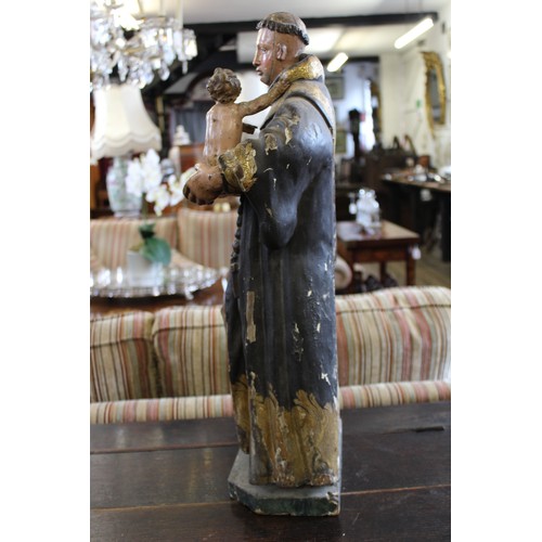 328 - An Italian carved painted wood and gesso figural carving of St. Anthony of Padua and Infant Christ, ... 