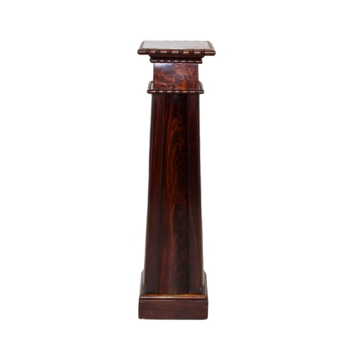 1003 - A 19th century and later constructed mahogany pedestal, the square top with a ring turned edge upon ... 