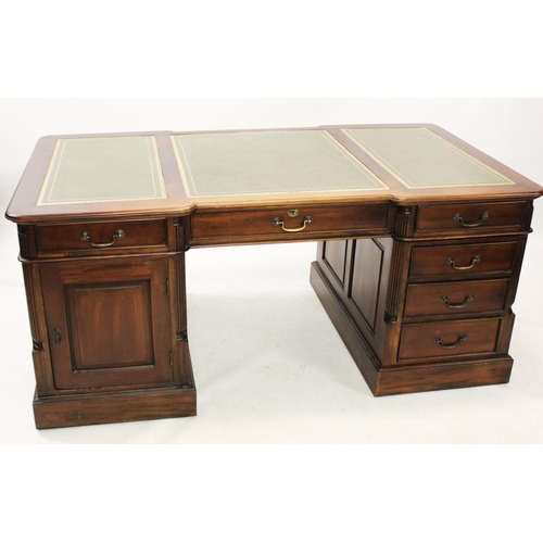 1025 - A 19th century style mahogany partners desk, the moulded inverted breakfront top inset with three gr... 