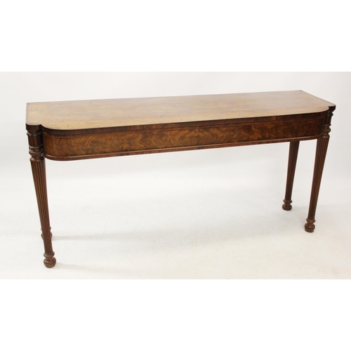 1039 - A mid 19th century mahogany console table, the shaped top above a plain frieze, raised upon tapering... 