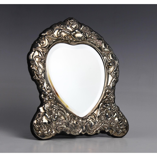 125 - A Victorian style silver mounted easel mirror by Carr's of Sheffield, 1995, the heart shaped glass w... 