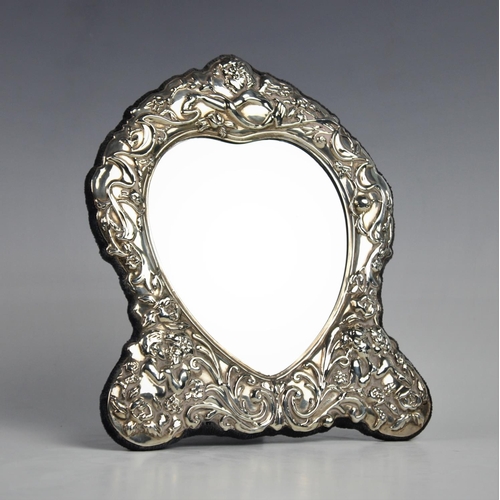 125 - A Victorian style silver mounted easel mirror by Carr's of Sheffield, 1995, the heart shaped glass w... 