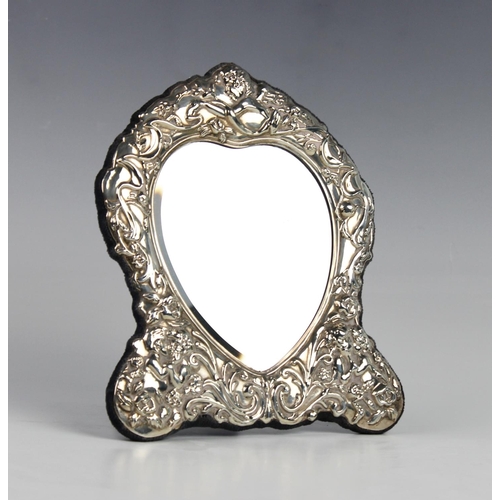 125 - A Victorian style silver mounted easel mirror by Carr's of Sheffield, 1995, the heart shaped glass w... 