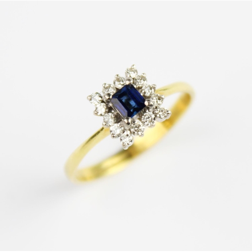 198 - A sapphire and diamond cluster ring, the central rectangular stepped cut sapphire (measuring 3.4mm x... 