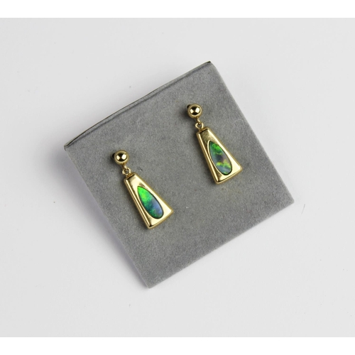 201 - A pair of 14ct gold opal set drop earrings, each designed as a tapered panel set with a teardrop sha... 