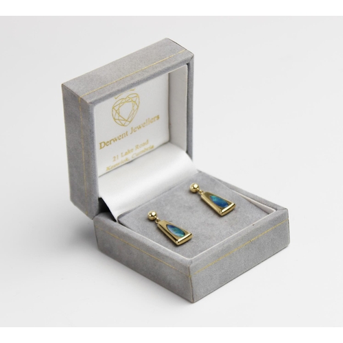 201 - A pair of 14ct gold opal set drop earrings, each designed as a tapered panel set with a teardrop sha... 