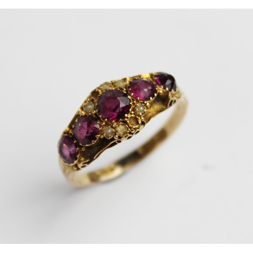 213 - A Victorian amethyst and pearl 15ct gold ring, comprising five graduated mixed cut amethysts (measur... 