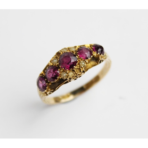 213 - A Victorian amethyst and pearl 15ct gold ring, comprising five graduated mixed cut amethysts (measur... 