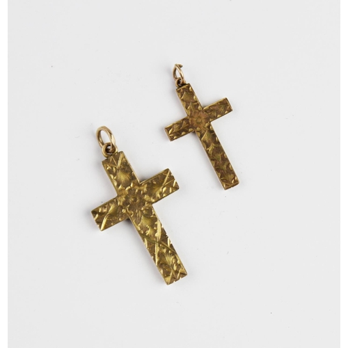 217 - A 9ct gold cross pendant, with engraved floral decoration to front, 30mm x 19mm, marks for Birmingha... 