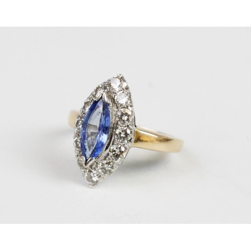 316 - A sapphire and diamond cluster ring, the central marquise cut sapphire (measuring 13mm x 5.5mm x 3.5... 