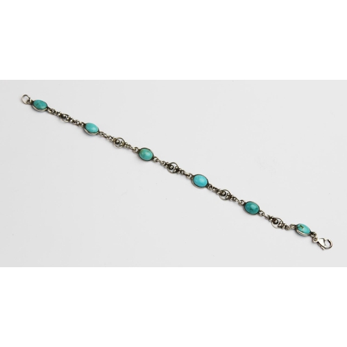 322 - An Arts & Crafts style silver and turquoise bracelet, comprising six polished turquoise cabochons ea... 