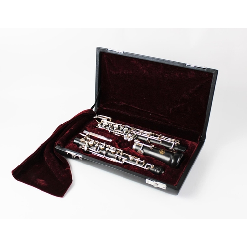 355 - A Rosedale oboe, in original fitted hard case with carry bag, retailed, set up and tested by gear4mu... 