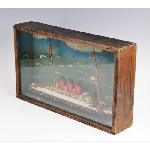 370 - A vintage cased handmade, scratch-built model of a three funnelled ocean going liner, the wooden mod... 