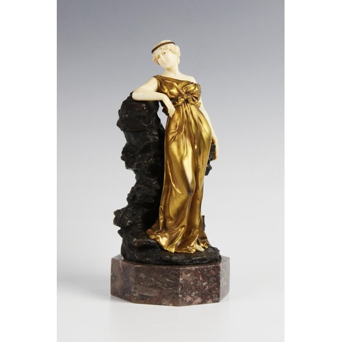 379 - An Art Deco gilt bronze and ivory figure in the manner of Johann Philipp Ferdinand Preiss, early 20t... 