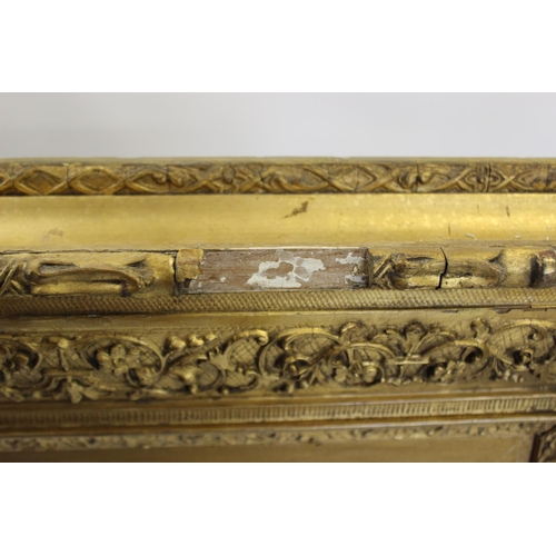 388 - A 19th century and later gilt wood and gesso wall mirror, the later mirrored plate within a frame mo... 