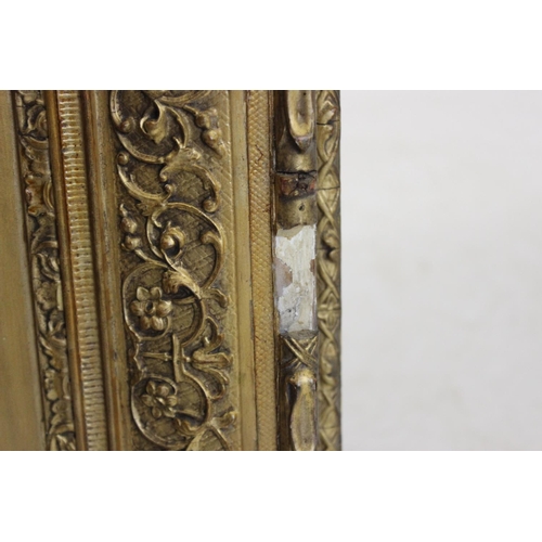 388 - A 19th century and later gilt wood and gesso wall mirror, the later mirrored plate within a frame mo... 