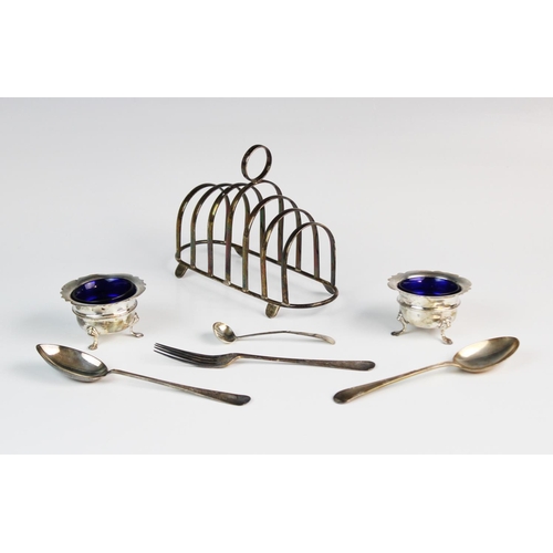 39 - A silver six-division toast rack by E J Houlston, Birmingham 1946, of oval form with seven graduated... 