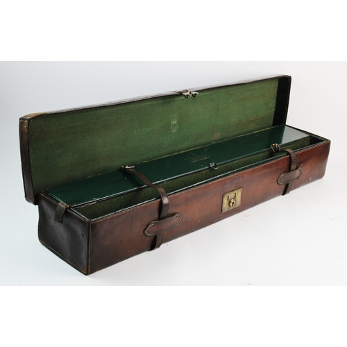 428 - A leather shot gun case by Bussey of London, mid 19th century, of narrow rectangular form with leath... 