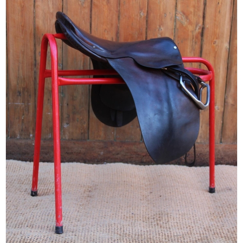 444 - A vintage Wycherley of Malpas leather saddle and a further pony size saddle (trees unchecked) (at fa... 