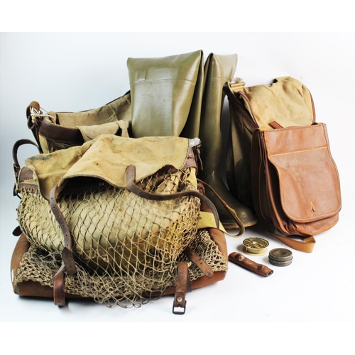 479 - A collection of four assorted vintage angling bags and fishing equipment, leather and canvas, along ... 