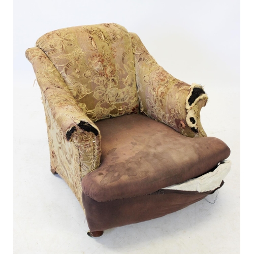 952 - A 19th century club chair, in foliate fabric, the down swept padded arms enclosing the sprung bow fr... 