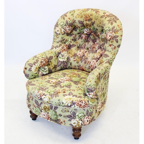 961 - A Victorian button back tub chair, covered in floral pattern fabric, the concave padded back over a ... 