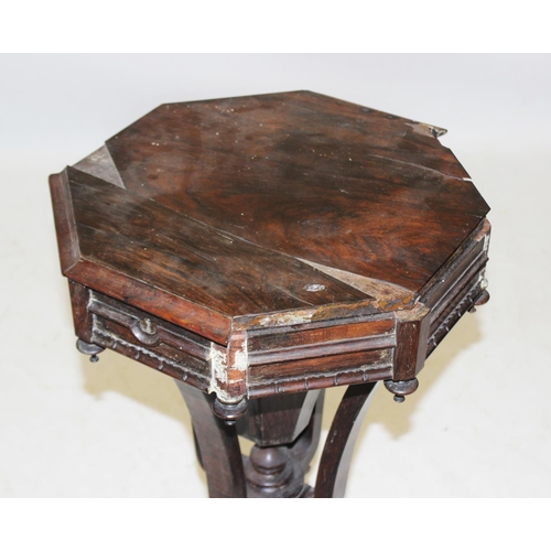 969 - A William IV rosewood teapoy, of pagoda form, the hinged top opening to a compartmentalised interior... 