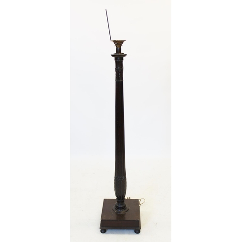 977 - A 19th century and later converted mahogany pedestal standard lamp, of tapering reeded form, carved ... 