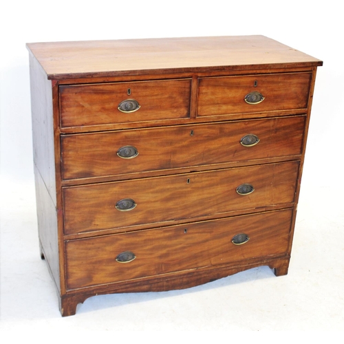 979 - An early 19th century mahogany chest of drawers, with an arrangement of two short and three long gra... 