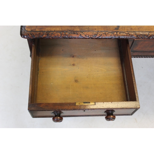 997 - A Victorian mahogany twin pedestal desk, the rectangular top with inset writing surface, enclosed by... 